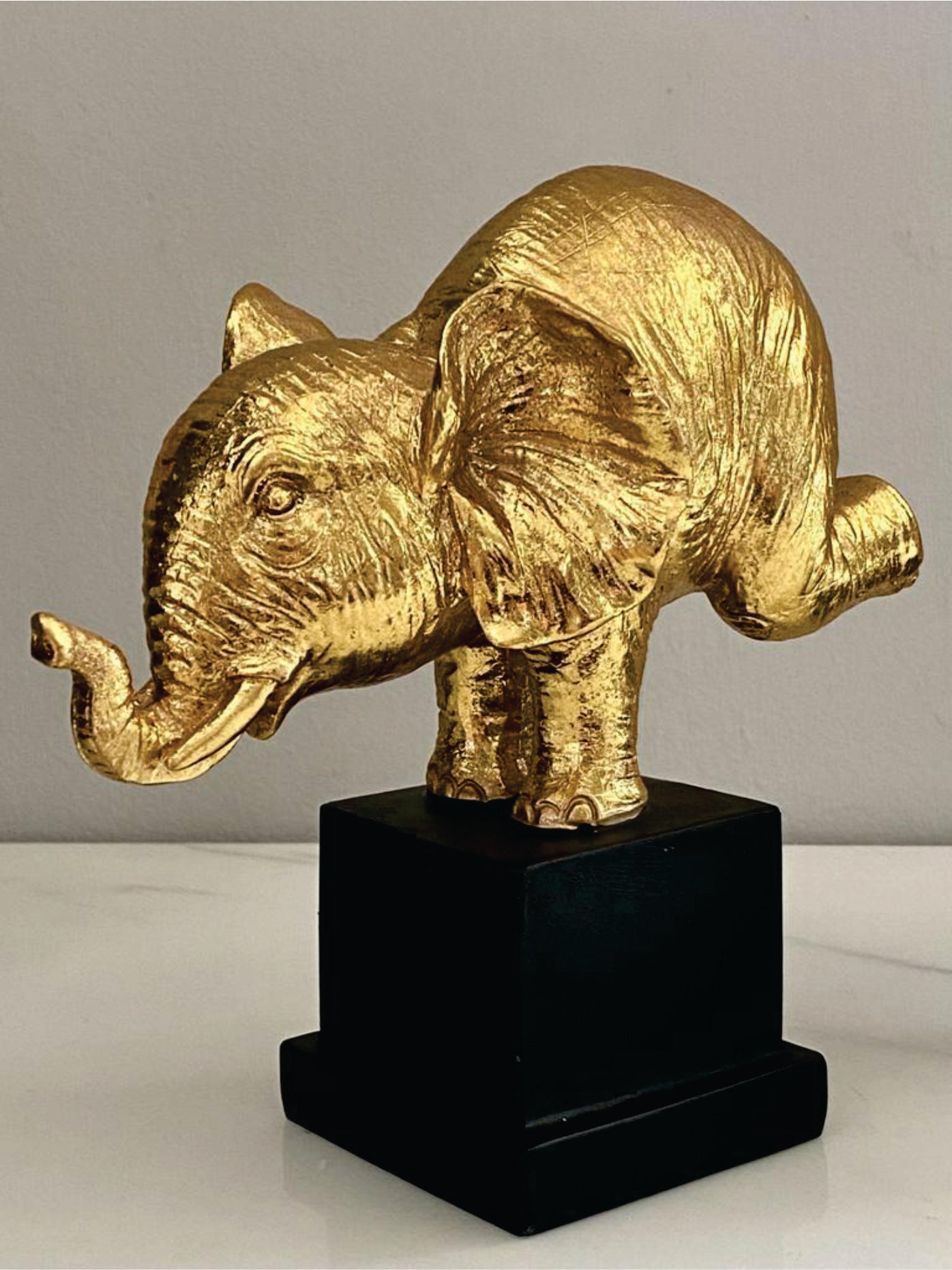 FIGURA DECORATIVA DE ELEFANTE DORADO
